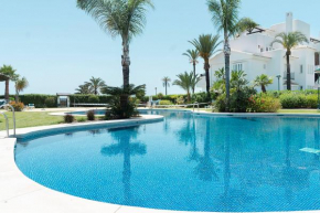 Front-line garden apartment in Palm Beach, Marbella, Marbella